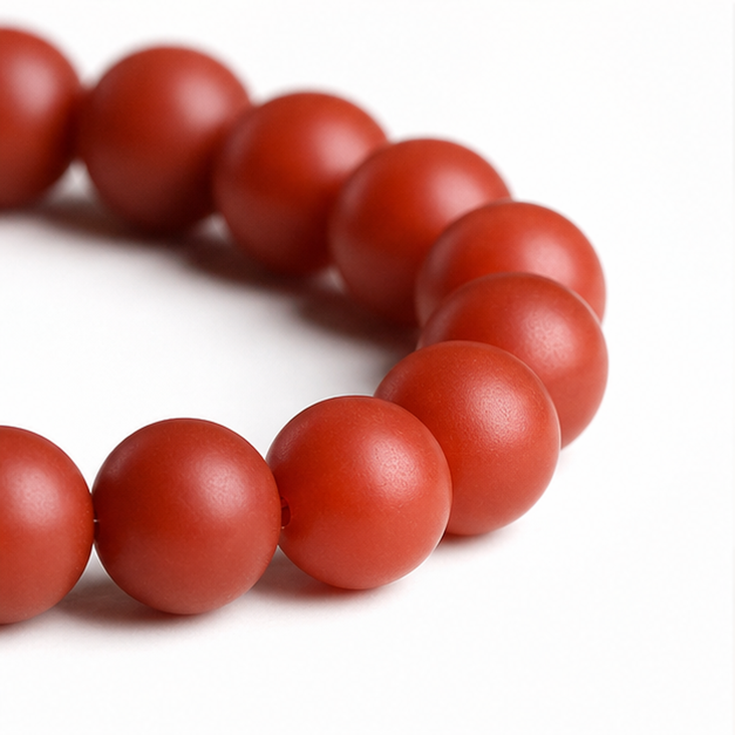 Close-up of Red Agate bead colour and surface detail