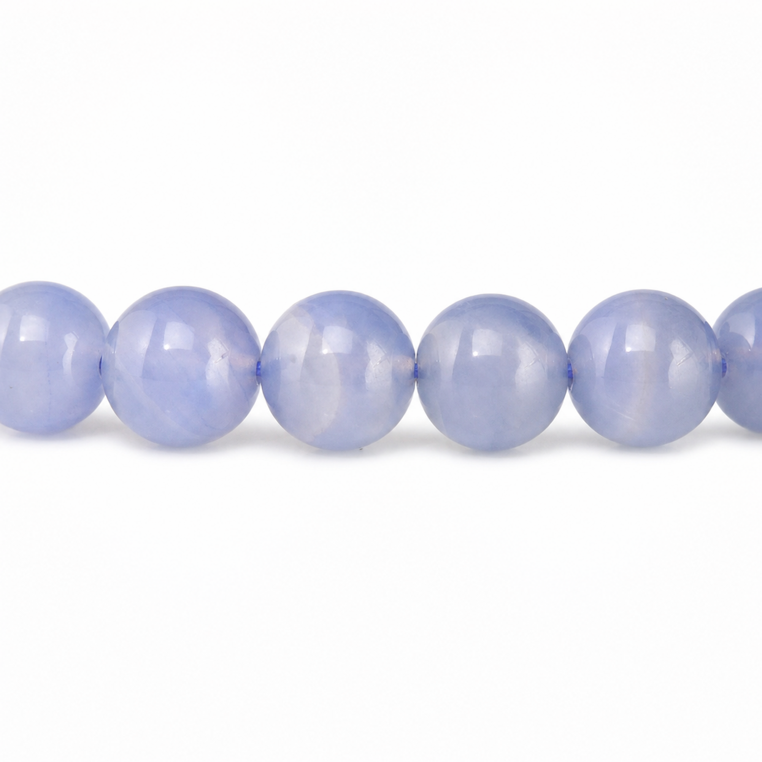 Close-up of Blue Lace Agate bead colour and surface detail