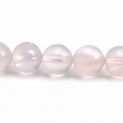 Close-up of Cherry Blossom Agate bead colour and surface detail
