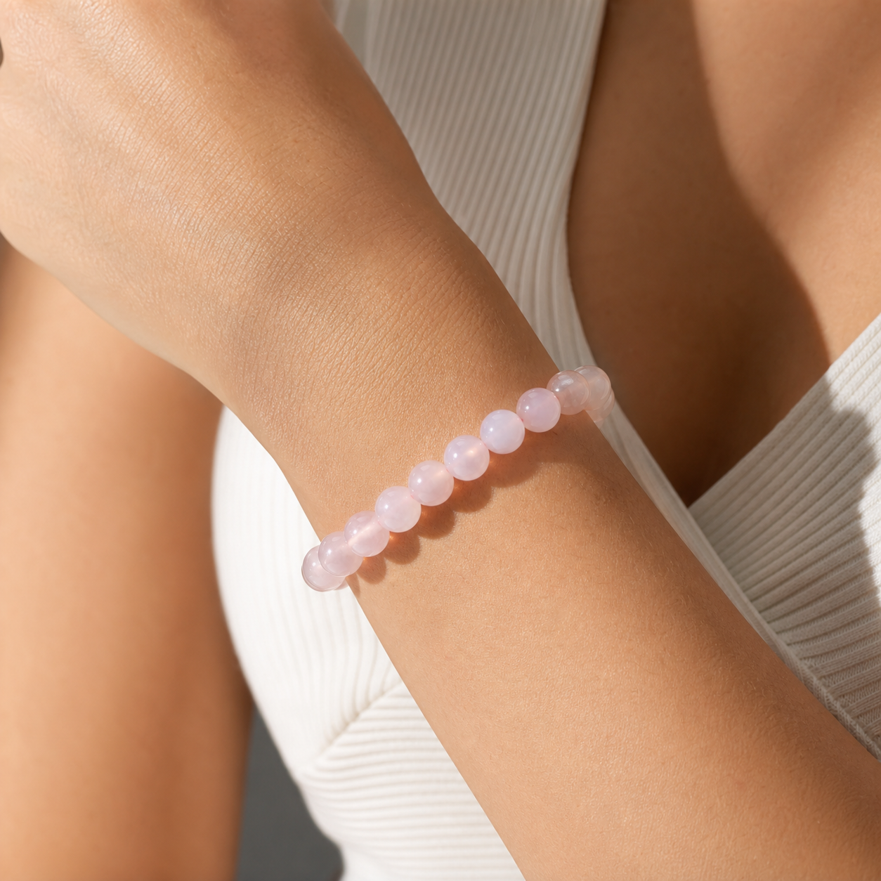 Close wrist detail of Cherry Blossom Agate