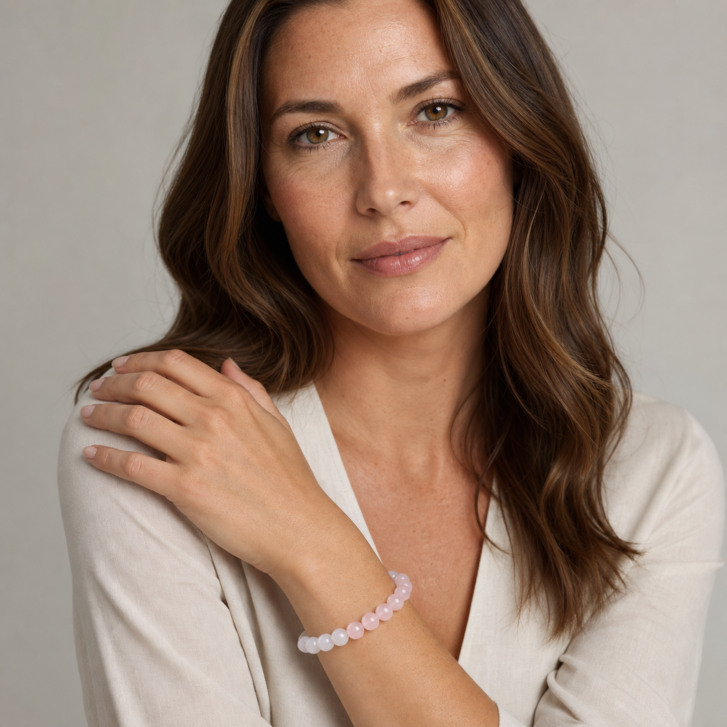 Rose Quartz worn by a woman with the bracelet in focus