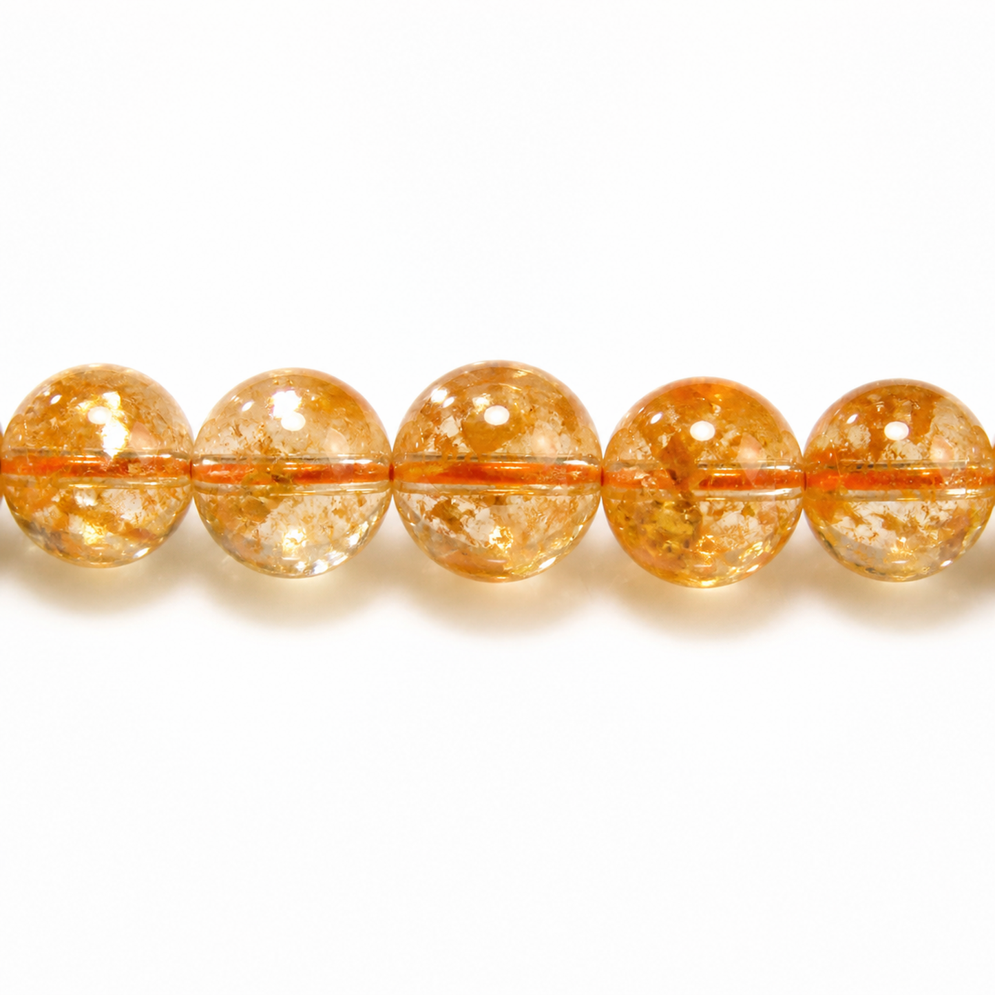 Close-up of Yellow Azeztulite bead colour and surface detail