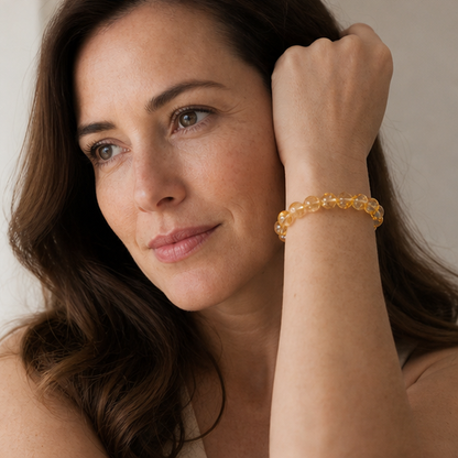 Yellow Azeztulite worn by a woman with the bracelet in focus