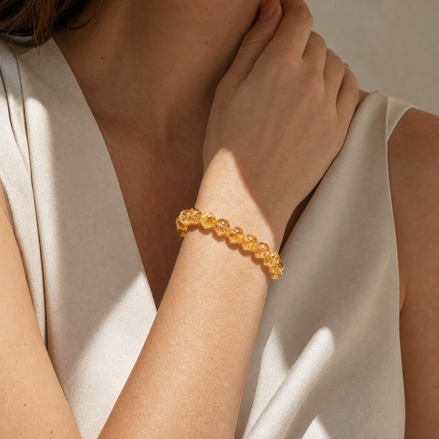 Close wrist detail of Yellow Azeztulite