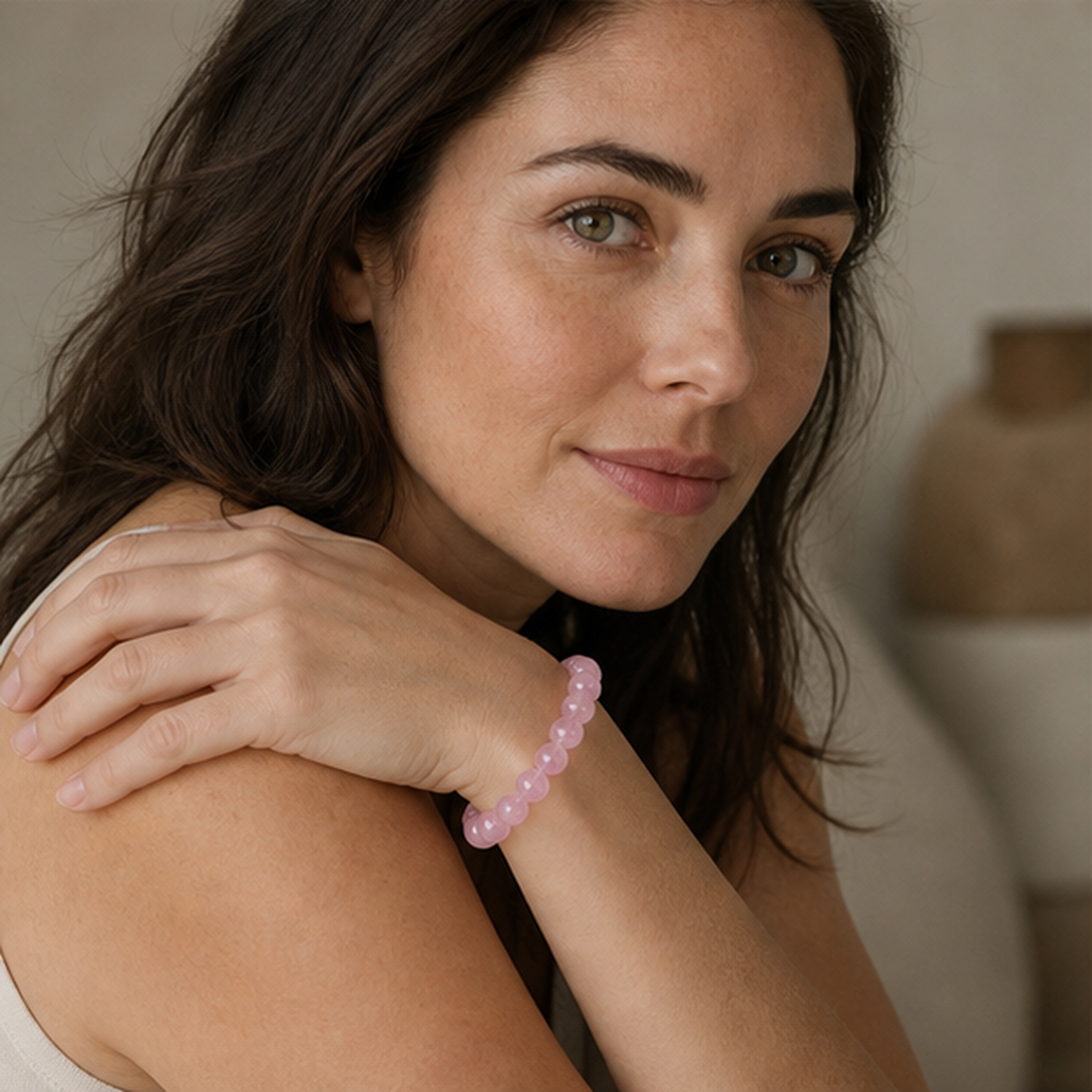 Madagascar Rose Quartz styled on a woman in a close product view