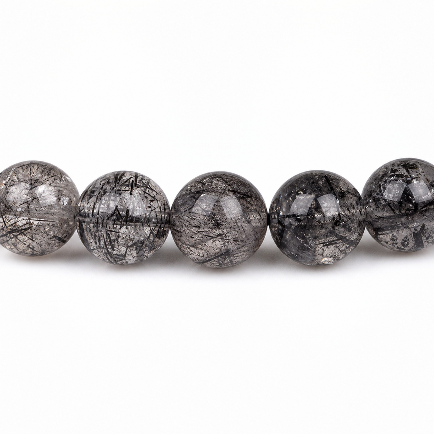 Close-up of Sparkling Quartz bead colour and surface detail