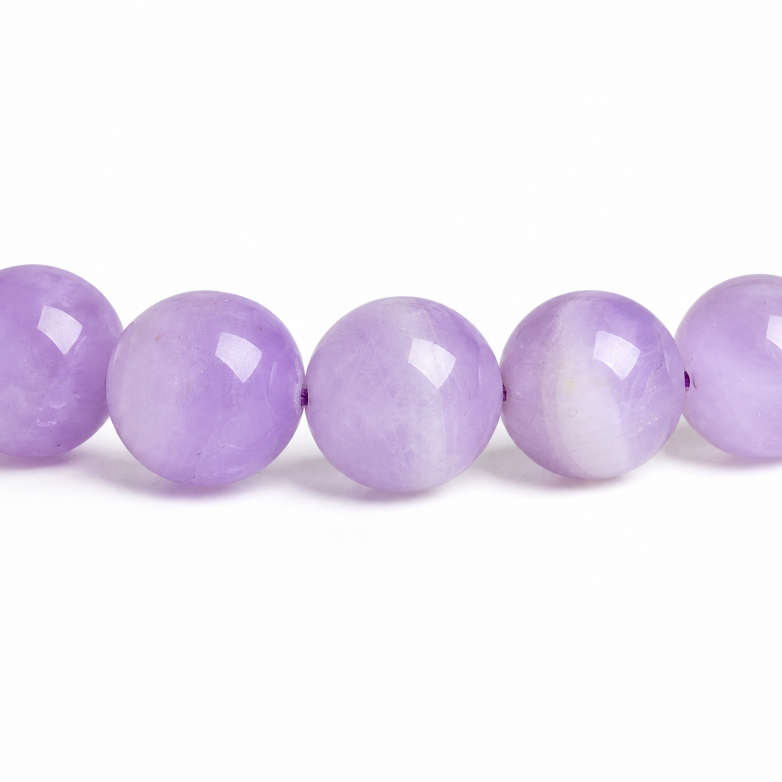 Close-up of Amethyst bead colour and surface detail