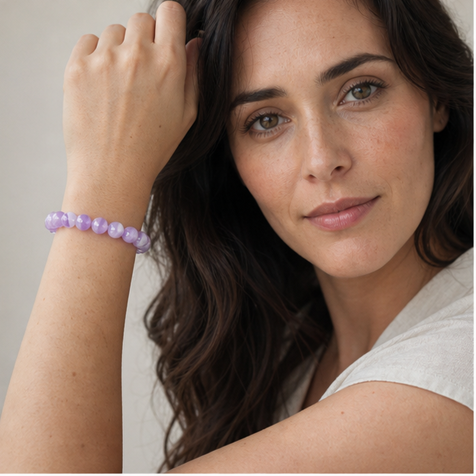 Amethyst worn by a woman with the bracelet in focus